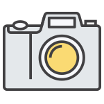 Outline icon of a digital camera with a yellow lens