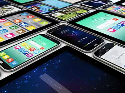 app-home Multiple smartphones and tablets displaying various app interfaces on their screens